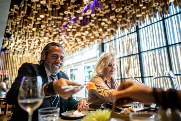 istock Coworkers eating on a japanese restaurant 2158830992