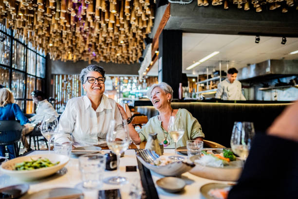 istock Coworkers talking on a japanese restaurant 2158831076