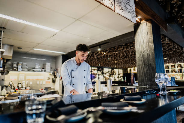 istock Chef cooking on a japanese restaurant 2158831971