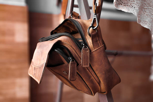 istock A leather bag that is aired, a leather bag that is hung on the clothesline 2158832348