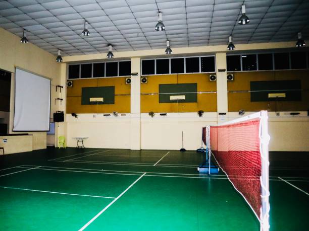 istock indoor badminton court with various facilities. 2158833994