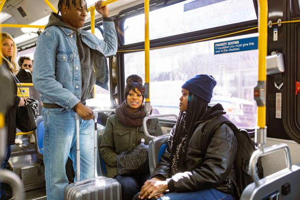istock Commuters Engaged in Morning Bus Ride 2158839200
