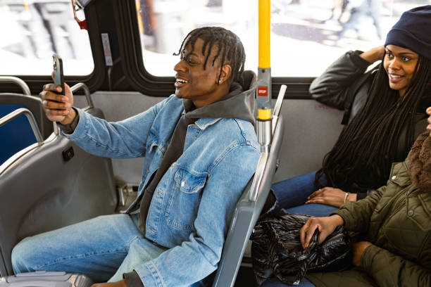 istock Happy Friends on a Bus Ride Morning 2158839232