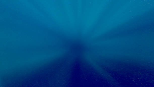 istock Sunlight against the background of the abyss 2158839533