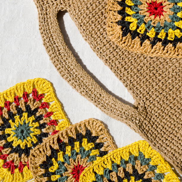 istock Eco-friendly raffia bag. Beautiful handmade crocheted beach bag. 2158839667