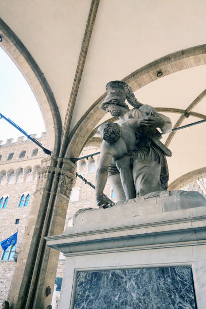 SAINT PETERSBURG, RUSSIA - JUNE 16, 2021. Granite stone statues of Atlantes at the entrance to the new Hermitage in the northern capital of Russia, St. Petersburg. A famous tourist attraction all over the world. The place is often rented in the cinema.