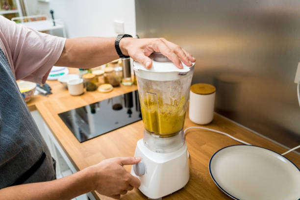 istock Chef at the kitchen preparing chickpea porridge with ginger 2158841874