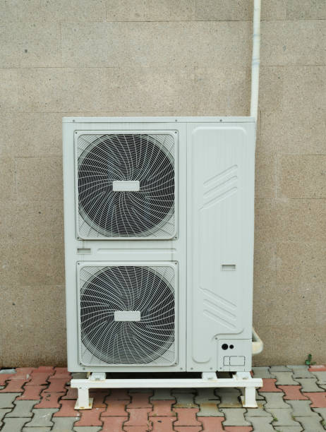 istock Air source heat pump installed in building. Sustainable and clean energy 2158843317