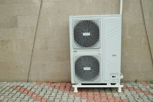istock Air source heat pump installed in building. Sustainable and clean energy 2158843446