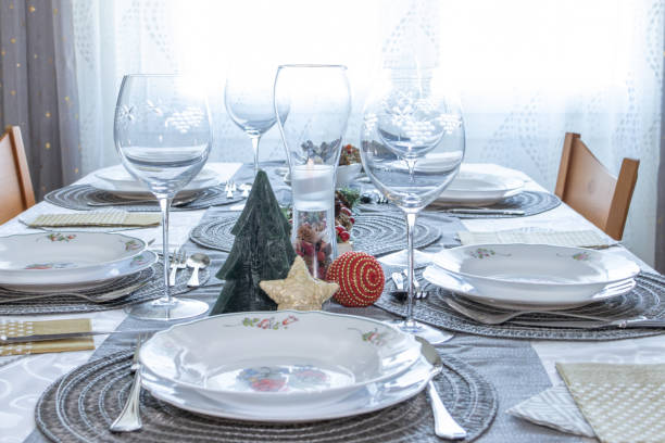 istock decorated table with Christmas theme for the December winter meal 2158843663