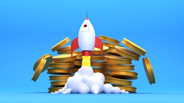 istock Cartoon style rocket launching against stacks of gold coins. Wealth in the space industry. 2158844607