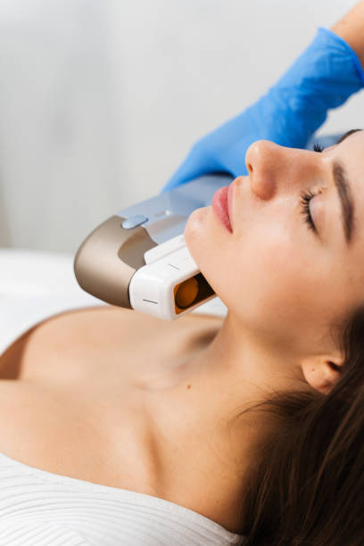 istock Needle-free rf-lifting process. Face-lifting with help of special cosmetology device. 2158845425