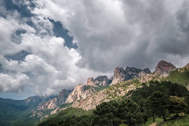 The Aiguilles de Bavella, needle like rocky mountain peaks surrounded by pine forest and maquis in the centre of Corsica