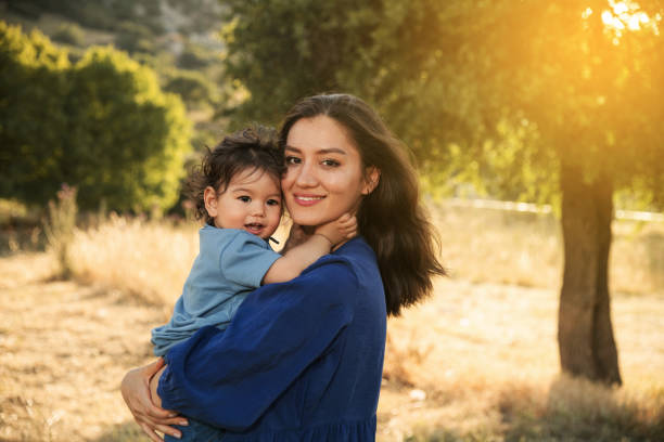 istock Mother and Son Enjoying a Sunny Day in Nature 2158853743