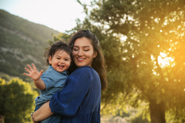 istock Mother and Son Enjoying a Sunny Day in Nature 2158853749