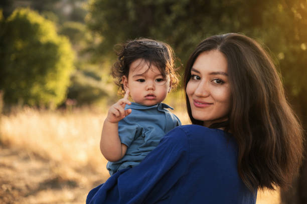 istock Mother and Son Enjoying a Sunny Day in Nature 2158853771