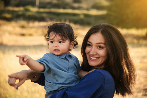 istock Mother and Son Enjoying a Sunny Day in Nature 2158853775
