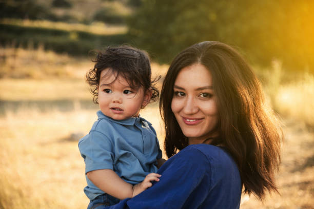 istock Mother and Son Enjoying a Sunny Day in Nature 2158853783