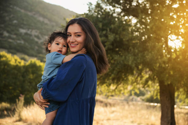 istock Mother and Son Enjoying a Sunny Day in Nature 2158853784