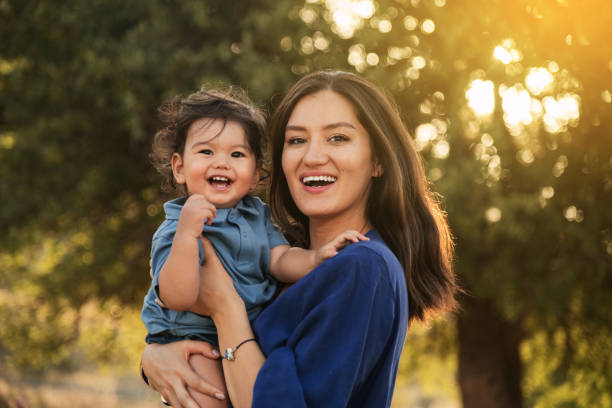 istock Mother and Son Enjoying a Sunny Day in Nature 2158853801