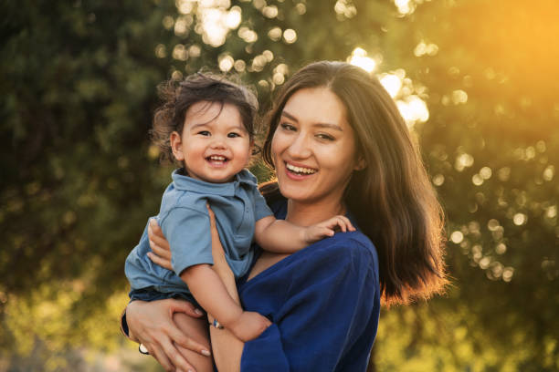 istock Mother and Son Enjoying a Sunny Day in Nature 2158853817