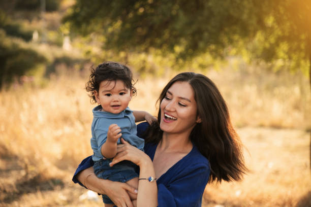 istock Mother and Son Enjoying a Sunny Day in Nature 2158853827