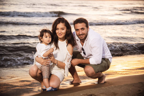 istock Family Interaction at Sunset Beach 2158854162
