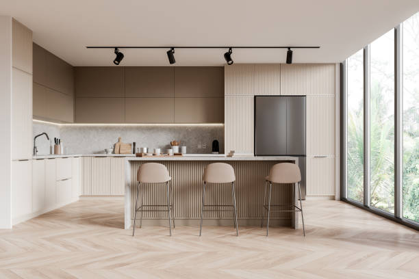 istock Stylish hotel kitchen interior with bar counter and chairs near panoramic window 2158856237