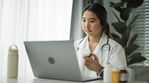 istock Female doctor checking medicine. 2158856380