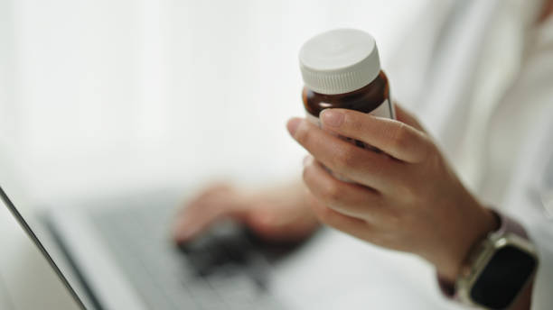 istock Female doctor checking medicine. 2158856405