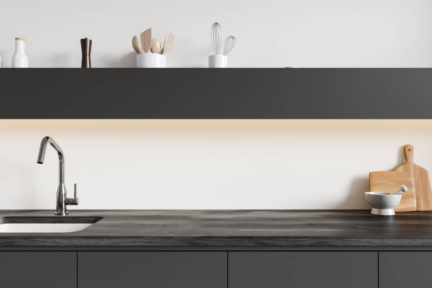 istock Dark home kitchen interior with cabinet, sink and kitchenware on shelf 2158856654