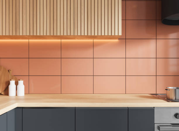 istock Modern home kitchen interior with stove and empty counter, tile wall 2158857083