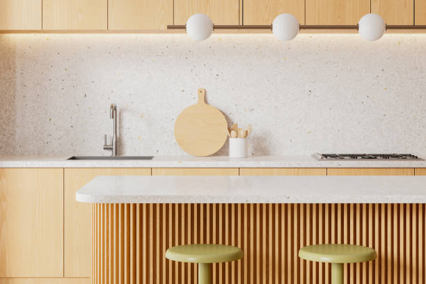 istock Stylish home kitchen interior with bar island and stool, cabinet with kitchenware 2158857147