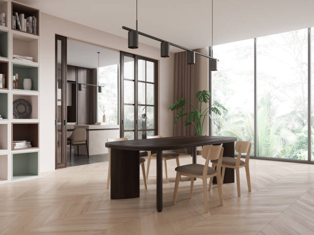 istock Modern dining room with wooden table and chairs, minimalist decor, large windows showcasing greenery, bright interior. Concept of contemporary living. 3D Rendering 2158857273