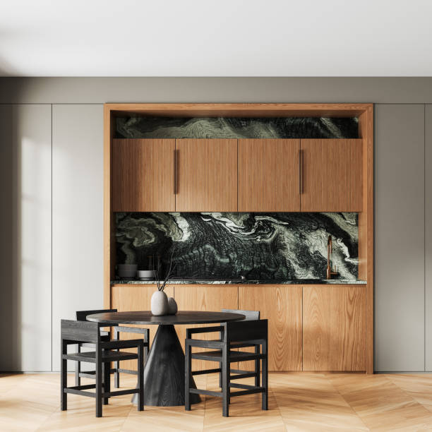 istock Wooden home kitchen interior with eating table and cabinet with kitchenware 2158857391