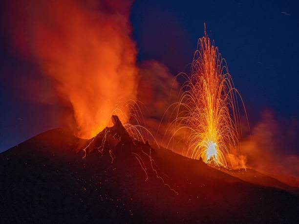 istock Nighttime activities and explosions on two Stromboli craters 2158863428