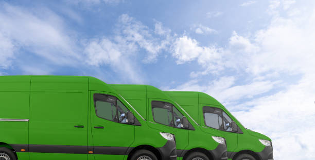 istock Green delivery vans in a row. Clean transportation concept 2158865618