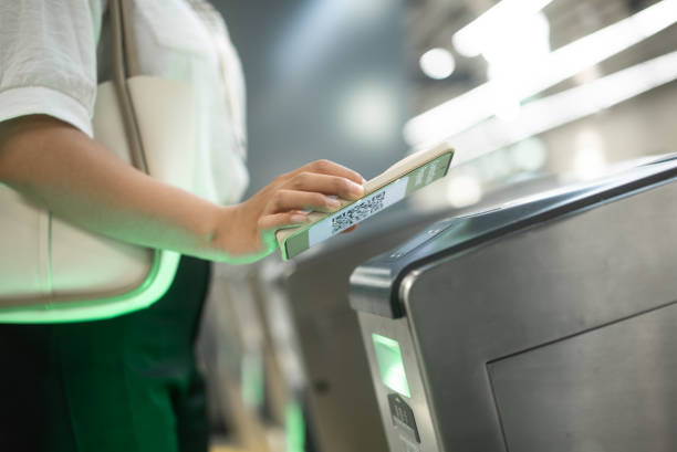istock check in at subway with smart phone 2158865954