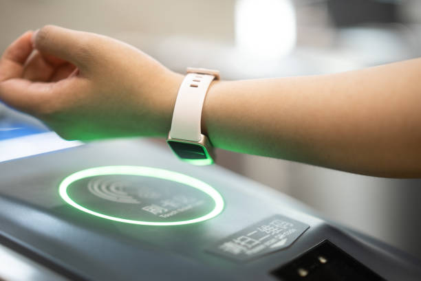 istock check in at subway with smart watch 2158865965