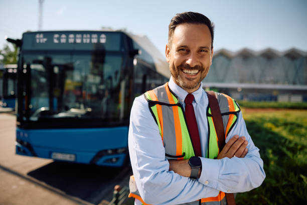 istock Happy driver at buss station looking at camera. 2158867373