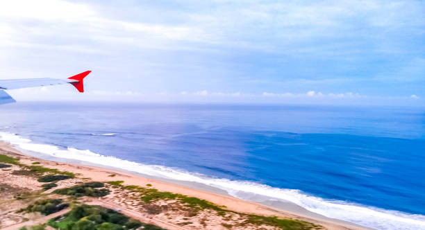 istock Plane landing on coast Puerto Escondido view from window Mexico. 2158872211