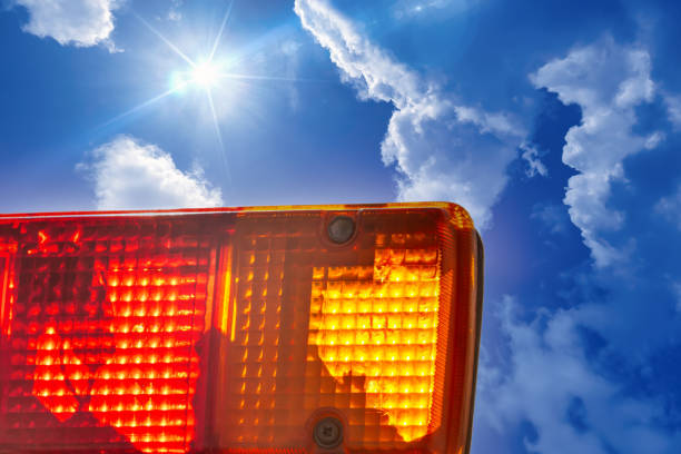 istock emergency light red and orange against the blue sky 2158872220