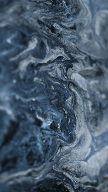 Shiny paint cascade wet glitter texture silver ink