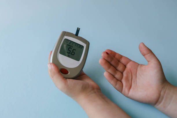 istock Child measuring blood sugar level 2158874801