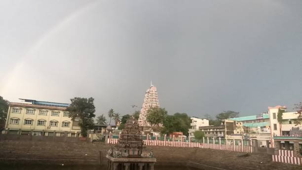 Lord Shiva temple with rainbow beautiful background