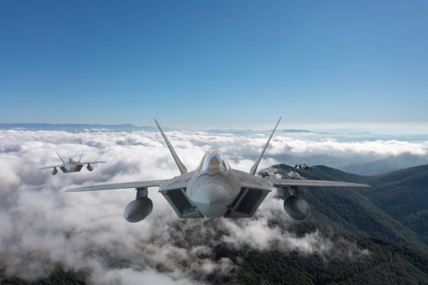 istock Jet aircrafts flying over the clouds. 2158881505