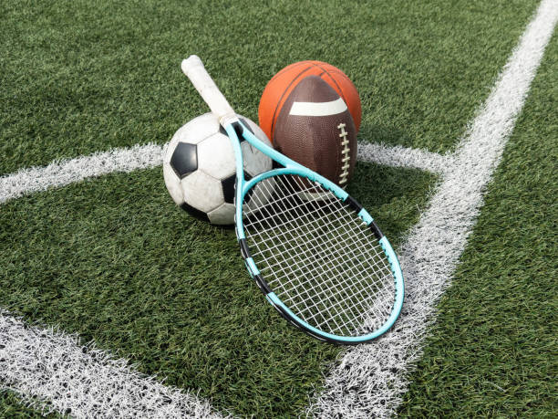 istock Many different sports balls on green grass, space for text 2158883071