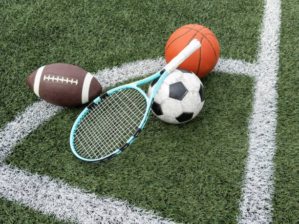 istock Volleyball net and different types of balls 2158883254
