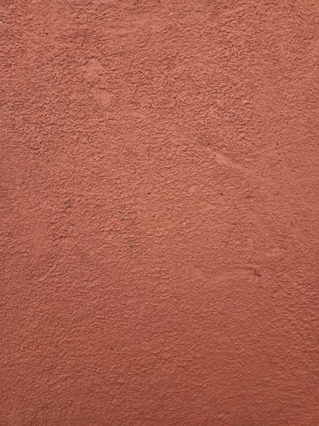 istock Terracotta color painted concrete background 2158884251