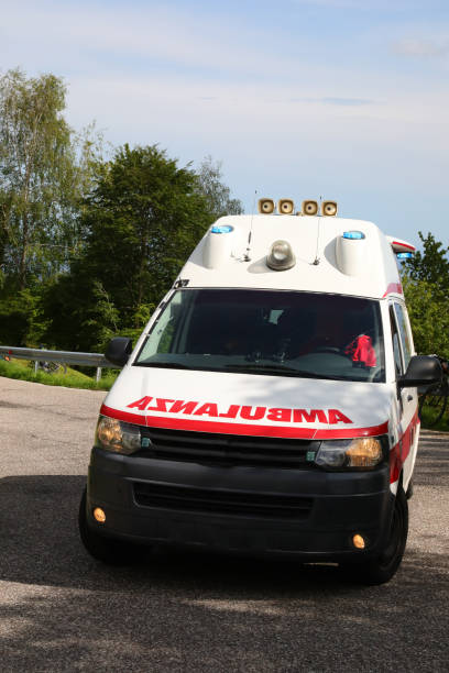 istock emergency van with the italian text AMBULANZA spelled backward so that it can be read clearly in the rearview mirror 2158885422